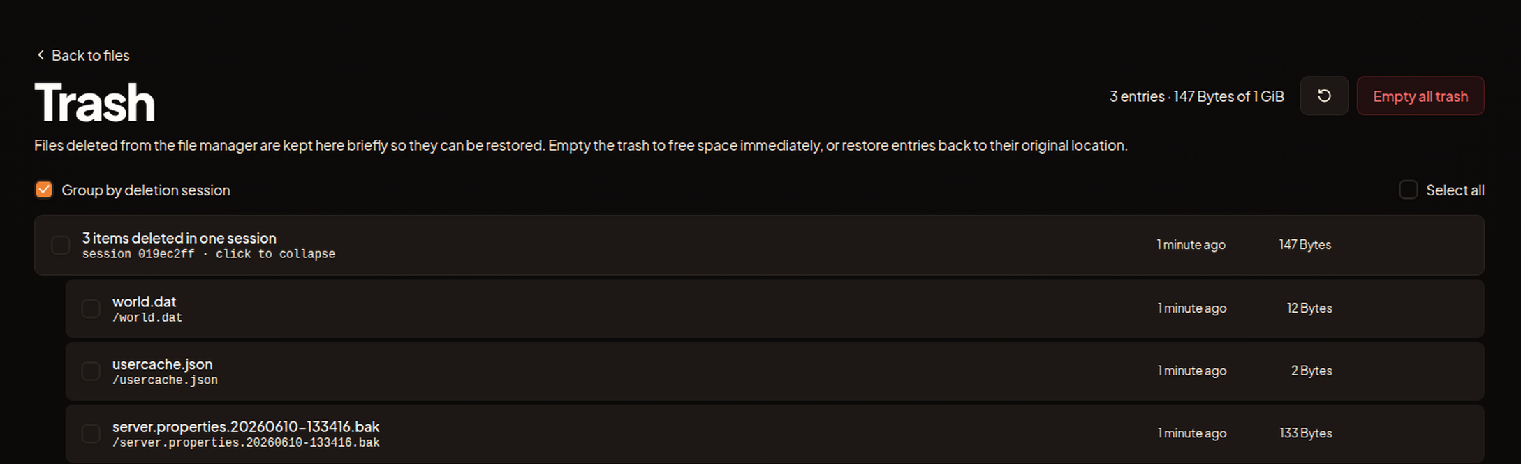 The Trash page grouped by deletion session with the Restore selected and Empty selected bar.
